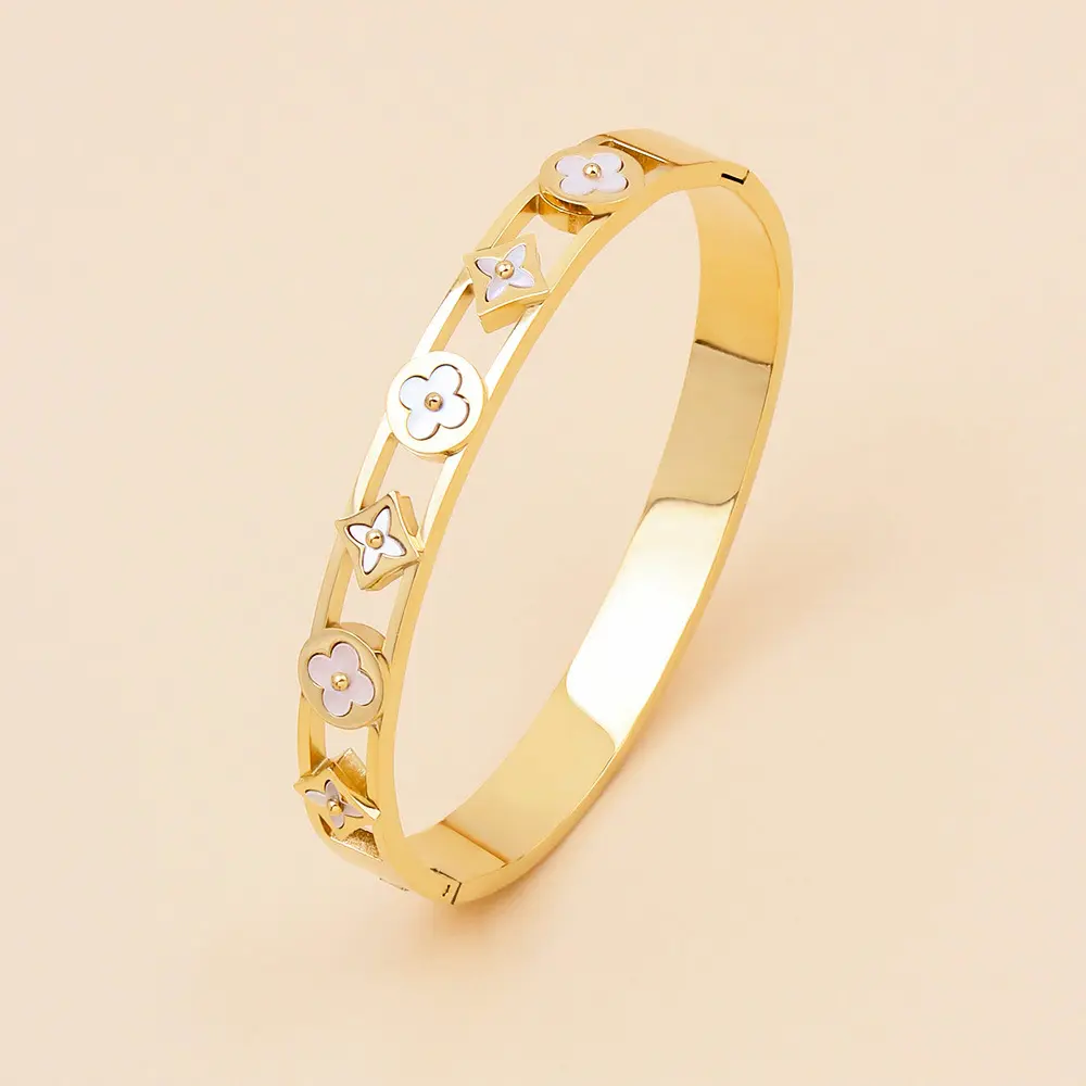 High quality gold plating hollow four-leaf clover titanium steel open bracelet