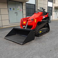 Mini-chargeuse sur chenilles SMT-V1000 avec moteur diesel 25 CV et godet 4-en-1 pour le renouvellement du sol et les travaux de plantation en serre