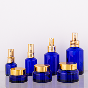 Sang trọng Mặt Kem container chai thủy tinh màu xanh với Vàng bơm phun và ống nhỏ giọt niêm phong loại cho mỹ phẩm bao bì - Product Image 1