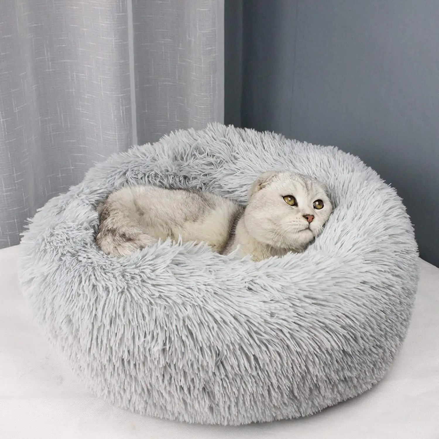 Harga pabrik tempat tidur donat bulu palsu berkualitas tinggi tempat tidur hewan peliharaan bulat dapat dicuci tempat tidur anjing dan kucing untuk hewan peliharaan