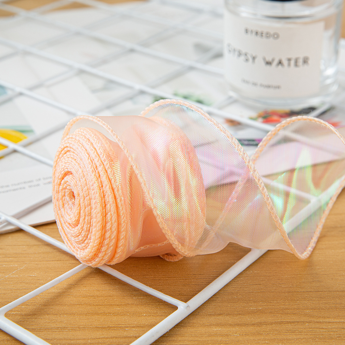 ผ้าทูลล์เมอร์เมดสีชมพูแชมเปญเหลือบสีรุ้ง ขนาด 4 ซม. ยาว 10 หลา (ม้วน)
