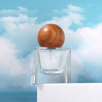Flacon de parfum en verre carré de luxe de haute qualité, vente chaude, 30 ml, 50 ml, 100 ml, avec bouchon en bois