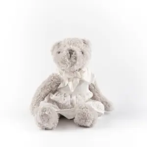 Cute grey bear soft white dress to accompany the comfort of the wedding decoration