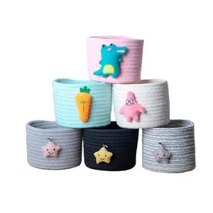 Factory direct desktop cosmetic storage basket small cotton rope sundries woven basket with cute doll storage basket