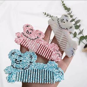 Peigne à cheveux en forme de chien de dessin animé mignon accessoire de cheveux élégant simple et ludique pour filles en acétate - Product Image 3