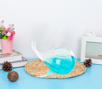 Bouteille d'huile essentielle de diffuseur de roseau en verre fait à la main en forme de baleine personnalisée en gros