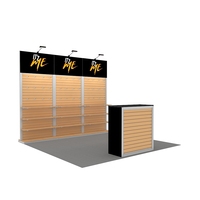 Stand d'exposition modulaire en aluminium portable 10x10 avec étagères pour salon professionnel et événements