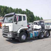 Тягач Sinotruk NX Tx 6X4, тяжелый, 40т, б/у, HOWO, дизель Евро-2, леворульный, двигатель Weichai, 10 шин