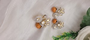 traditional floral pendant and <b>earring</b> set crafted with a combination of sparkling stones and vibrant orange accent jewelry set - Product Image 3