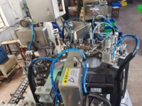 Ligne de production de têtes de pulvérisation portatives à structure compacte, sans entretien, avec surveillance à distance et support technique mondial