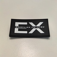 Étiquette en silicone 3D gaufrée à coudre avec logo de marque privée pour vêtements, patch souple en PVC pour sacs et chaussures