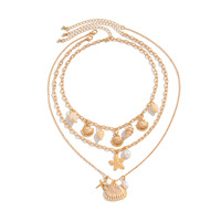 Collier pour femme en or 14 carats, style bohème, multi-couches, avec pendentifs étoile de mer, coquillage, conque et perles d'imitation, chaîne de clavicule haut de gamme