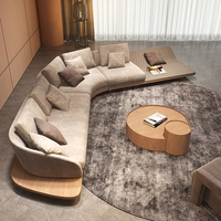 Ensemble de salon canapé villa design moderne canapé en tissu et cuir en forme de L avec plate-forme canapés d'angle incurvés