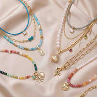 Collier multi-couches personnalisé EDGE avec perles bleues, pendentif éclair doré, bijoux élégants et tendance, collier OEM ODM pour femmes