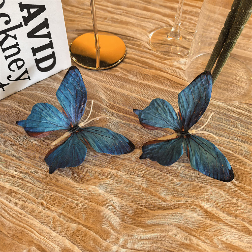 Pair of blue butterfly shoe clip