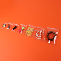 Petit emballage de bijoux en PVC personnalisé sac en plastique à fermeture éclair sac à fermeture éclair transparent pour boucle d'oreille logo réutilisable mini sac de pochette à fermeture éclair en PVC