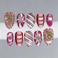 Faux ongles de Noël faits main en gros, forme amande, avec motifs canne à sucre, carreaux rouges et flocons de neige, réutilisables pour les fêtes de fin d'année