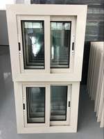 Fourniture en gros de fenêtres et de portes de maison coulissantes à double vitrage UPVC blanc à battant économique