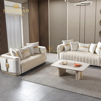 Canapé convertible moderne de luxe confortable à trois places avec pieds en acier inoxydable pour appartements et salons d'hôtel
