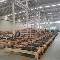 Precio de Fábrica Clásico Reformer de Pilates con Estructura de Madera de Roble para Entrenamiento de Fuerza Central y Ejercicio de Pilates