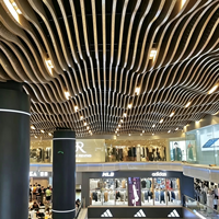 Système de déflecteurs de plafond en aluminium, forme vague moderne, imperméable et ignifuge, pour la décoration intérieure des atriums, des halls et des plazas intérieures