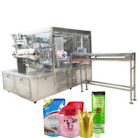 Machine de bouchage de remplissage de poche à bec rotatif automatique Machine de bouchage de remplissage de sac à buse Machine de remplissage de poche à bec