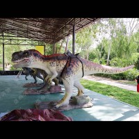 Dinosaure animatronique personnalisé à commande à monnayeur, à télécommande, avec revêtement en silicone et structure en acier, pour parcs d'aventure à thème rugissant