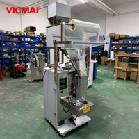 Machine d'emballage verticale automatique pour sachets, avec pesage de granulés et scellage, idéale pour l'emballage de petites collations, chips et frites