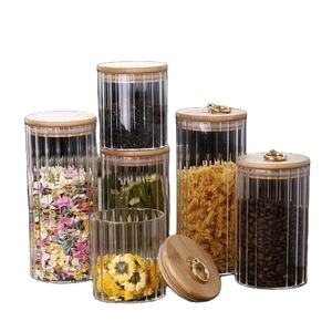 Pot scellé de nourriture à rayures verticales cylindriques de conservation fraîche avec couvercle en <span class=keywords><strong>bambou</strong></span> anneau de traction en métal couvercle plat pot de stockage en verre - Product Image 1