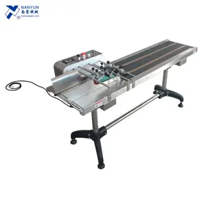 automatic food package bag spice pouch corrugated carton sheet feeding belt conveyor with label applicator laser coding machine