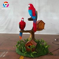 Perroquet animatronique réaliste rouge grandeur nature, simulation d'ara avec son et mouvement pour la décoration de parcs à thème jungle et jardins