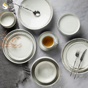 Juego de vajilla de cerámica gris celadón pintado a mano-Tazón, plato, tazas de café y platillos-Esmalte reductor con detalles en marrón - Product Image 6