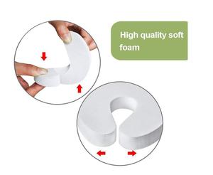 Tope de puerta de seguridad blanco, Protector de dedo de cuña, de silicona, estilo de hoja bonita - Product Image 1