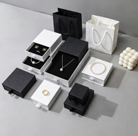 Boîte d'emballage de bijoux rectangulaire de qualité professionnelle, style tiroir, avec doublure en éponge, noir et blanc, organisateur multi-tailles pour boucles d'oreilles