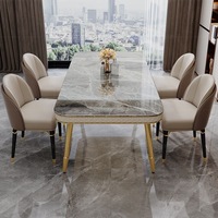 Table à manger et chaise de roche taille appartement lumière luxe moderne simple table à manger rectangulaire en marbre en acier inoxydable