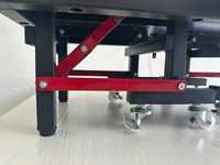 Table de ping-pong professionnelle compacte de 55 cm pour bureau, avec cadre rouge et plateau en MDF, idéale pour la réduction du stress au bureau.