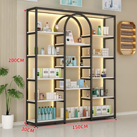 Promotion : Présentoir cosmétique doré pour salon et magasin, avec armoire intégrée, personnalisable (logo et dimensions)