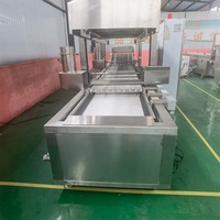 Ligne de production commerciale de friture entièrement automatique pour la production de frites et de poulet frit