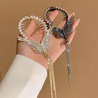 Barrette à cheveux en forme d'aile d'ange entièrement recouverte de strass brillants, élégante, avec pompon en perles, barrettes pour queue de cheval, chignon, bandeaux pour femmes et filles, accessoires pour cheveux
