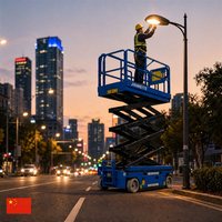 Plateforme élévatrice à ciseaux électrique Jinmeite 500 kg : Élévateur aérien sûr et fiable pour l'installation d'éléments en acier en grande hauteur