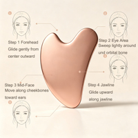 Outil de massage facial Gua Sha en acier inoxydable en forme de cœur couleur or rose