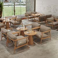 Ensemble de canapé, chaise et table en bois massif pour réception et négociation d'hôtel, style nordique de luxe, idéal pour les maisons d'hôtes et les salons de café-thé.