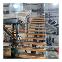 Escalier en bois massif personnalisé de haute qualité du fabricant Foshan Design moderne Mono Beam marches droites en verre pour appartements