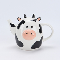 Adorable pot de rangement en céramique en forme de vache avec des taches noires et un nez rose pour ranger des biscuits, des bonbons ou de petits articles de cuisine