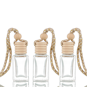 Venta al por mayor Mini botella difusora de aroma 8ml 10ml botella de perfume colgante de aceite de perfume de coche de vidrio portátil con tapa de madera - Product Image 5