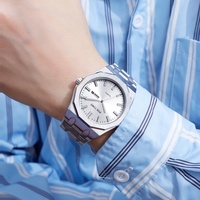 Montres pour hommes PINTIME avec lunette octogonale, cadran argenté effet soleil, double date, mouvement à quartz, bracelet en alliage, vente en gros OEM