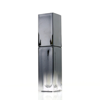 Tube de brillant à lèvres jumbo de 5 ml avec logo personnalisé et capuchon noir dégradé pour huile à lèvres de luxe