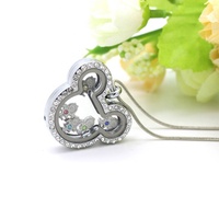 En cadeau, collier, chaîne, porte-clés, variété de pendentifs en verre à mémoire de forme, Bracelet en alliage, médaillon flottant magnétique en mémoire de