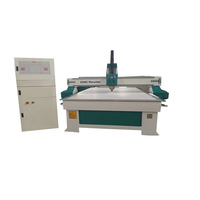 Machine de fraisage CNC pour le travail du bois 1325 avec garantie d'un an pour la fabrication de panneaux publicitaires en bois