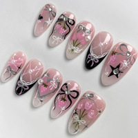 Lot de 24 faux ongles de luxe rouges en forme d'amande avec nœud papillon, pour salon de manucure, à presser, style modèle, pour pose DIY